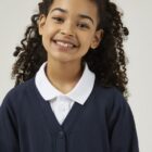 Close up of Trutex navy school sweat cardigan showing buttons, stitching and quality materials