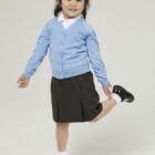 Children’s Trutex sky blue sweat cardigan worn as part of a school uniform, with long sleeves and a comfortable fit.