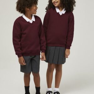 Maroon Trutex V-neck school jumper close up soft fabric ribbed cuffs detail