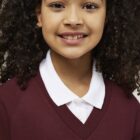 Maroon Trutex V-neck school jumper close up soft fabric ribbed cuffs detail