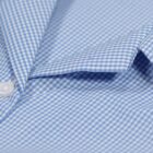 Close-up of non-iron fabric and blue check pattern on school blouse