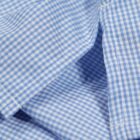 Close-up of non-iron fabric and blue check pattern on school blouse
