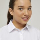 Close up of white slim fit school blouse